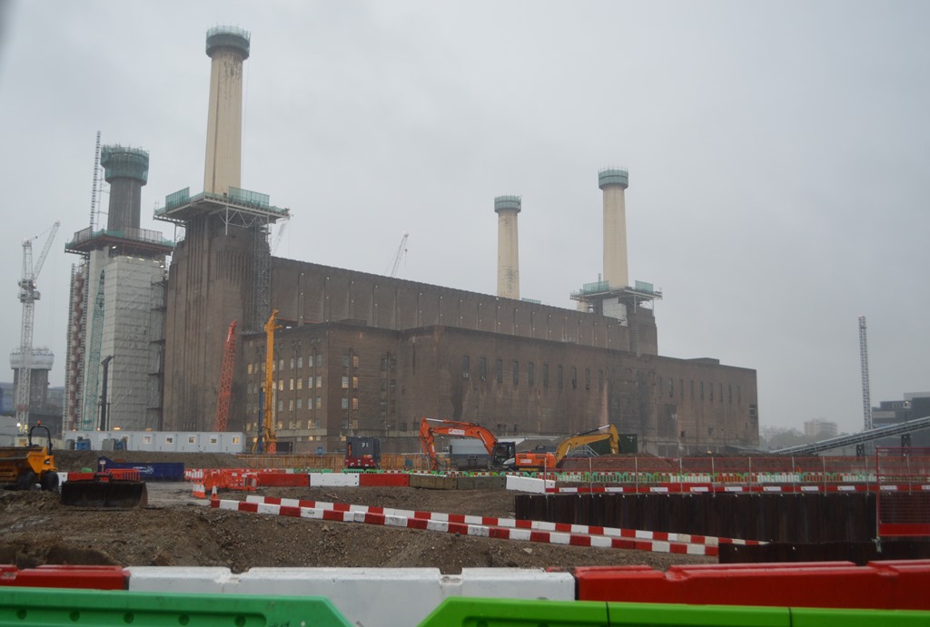 Battersea Power Station with towers and construction equipment