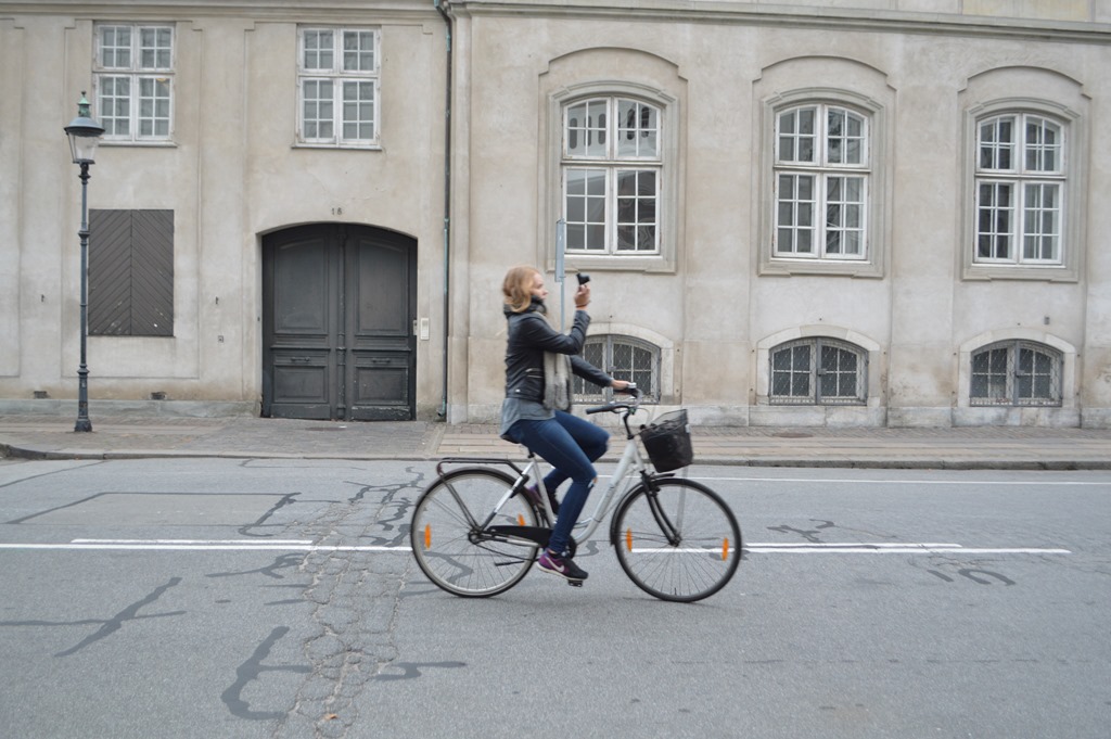 a woman on a bicycle
