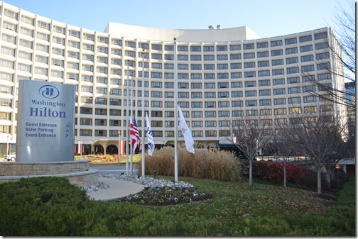 a large building with many flags