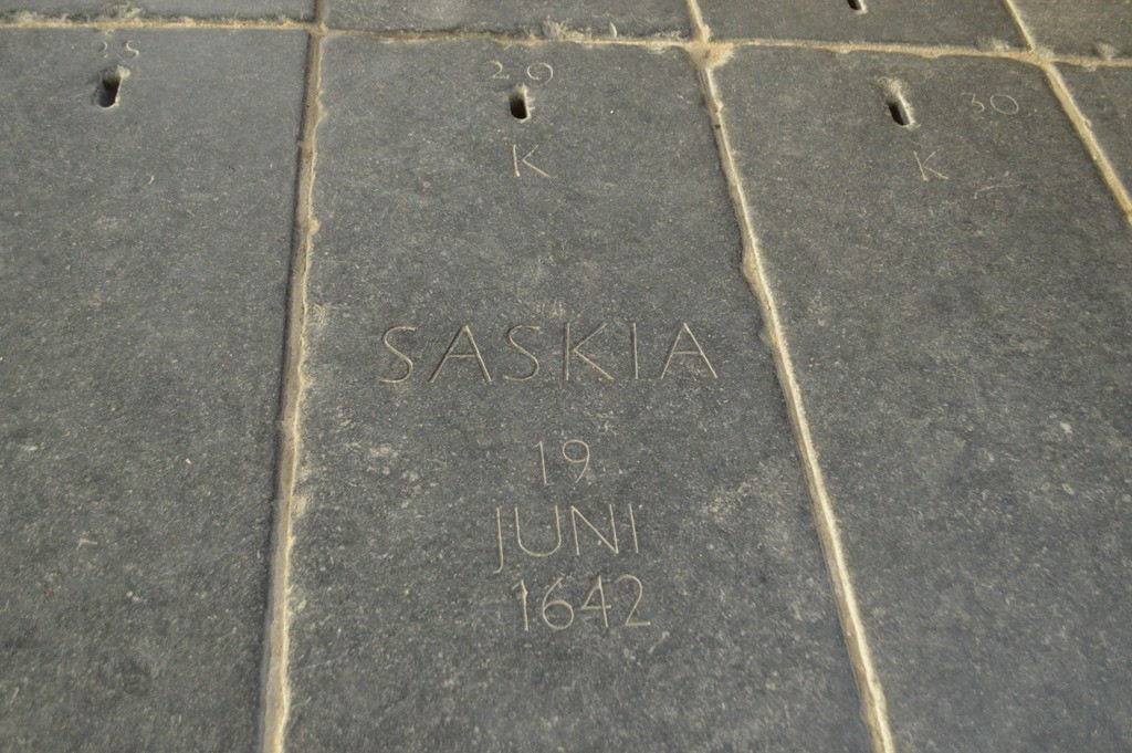 a stone surface with text engraved on it