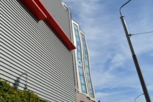 a tall building with a street light