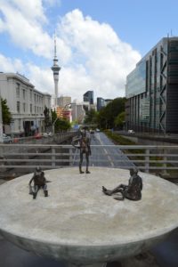 a group of statues on a concrete surface