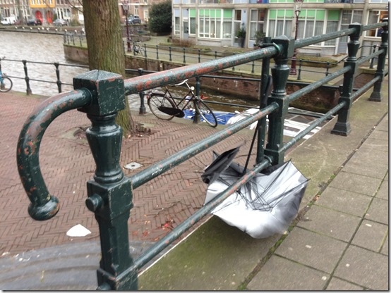 a bicycle parked on a sidewalk