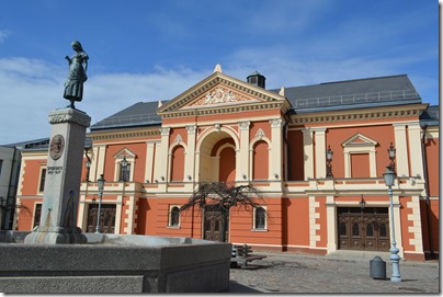 a building with a statue in front of it