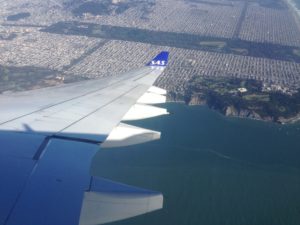 an airplane wing above water