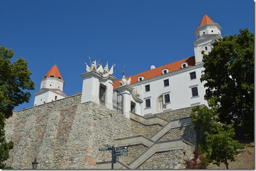 a white building with orange roofs