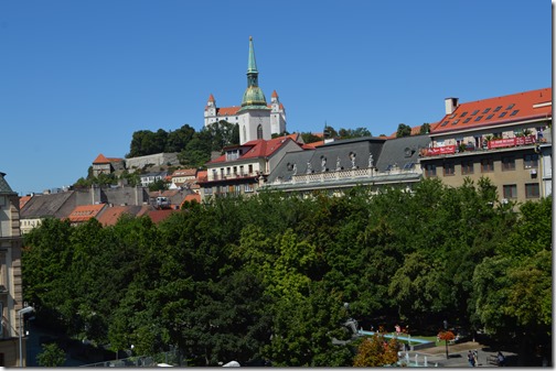 a group of buildings with trees