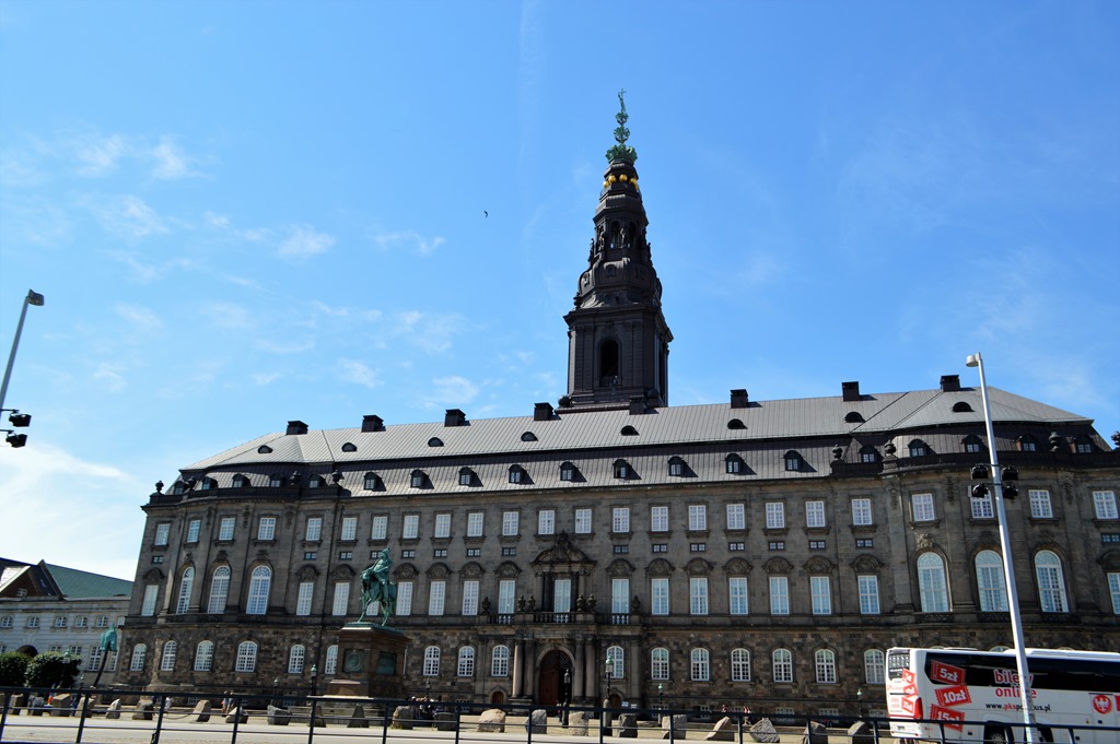 a large building with a statue on top