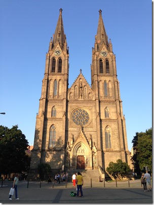 a large church with a clock on the top