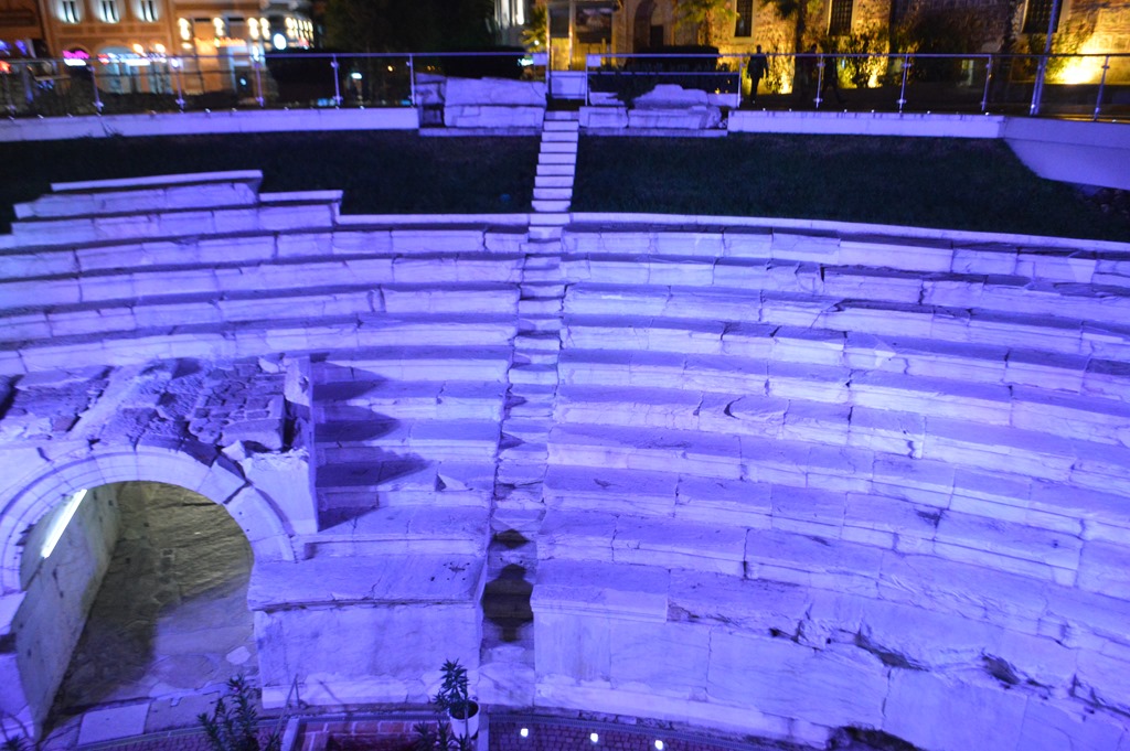 an old stone amphitheater at night