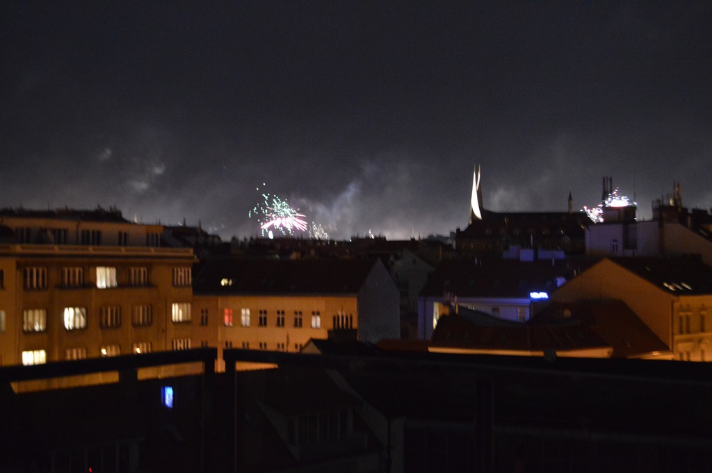 fireworks in the sky above a city