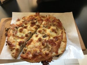 a pizza on a paper