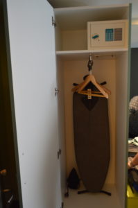 a ironing board in a closet