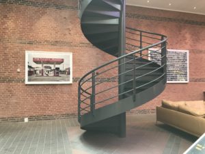 a spiral staircase in a room