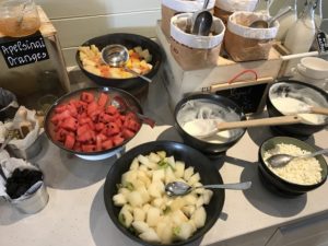 a table with bowls of food