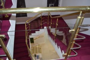 a staircase with a glass railing