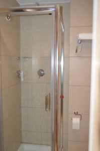 a shower with a glass door