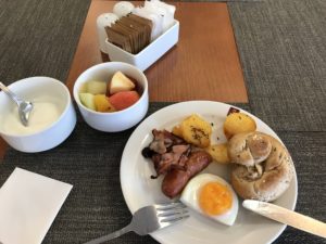 a plate of food with a fork and a knife