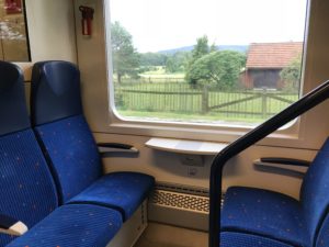 a blue seats in a train