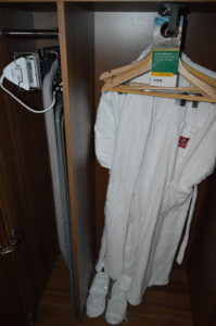a white robe on a swinger