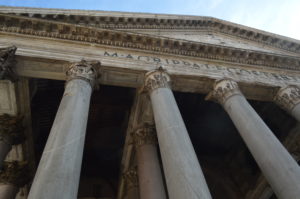 a low angle view of a building with pillars