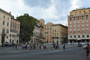 a group of people walking on a street