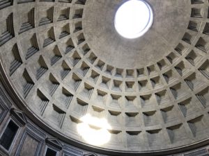 a ceiling with a round light