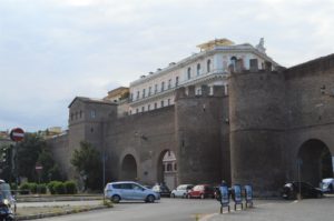 a large stone building with a large archway