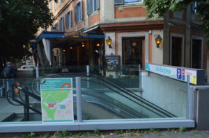 a escalator in front of a building