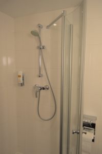 a shower with a hose