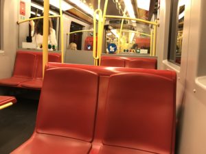 a red seats on a bus