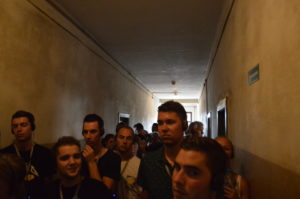 a group of people in a hallway