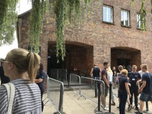 a group of people outside a building