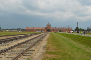 train tracks leading to a building