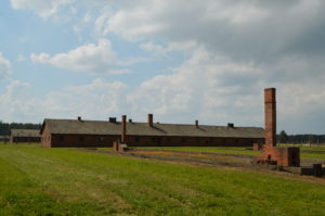 a building with a brick tower in the background