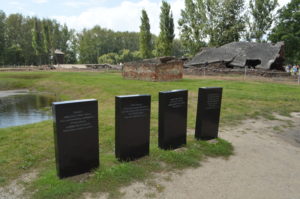 a row of black rectangular stones in a row