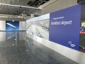 a large blue sign in a building