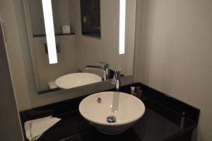 a sink and mirror in a bathroom