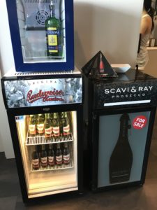 a refrigerator with bottles of beer