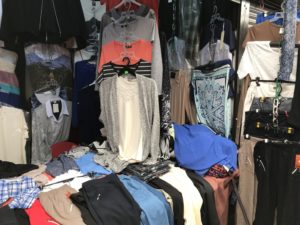 a group of clothes on swingers