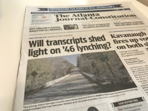 a newspaper with a picture of a road