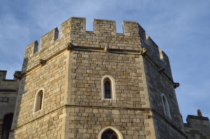 a stone tower with windows