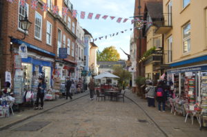 a street with people walking and people walking