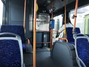 a person sitting on a bus