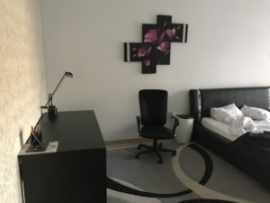 a room with a desk and chair