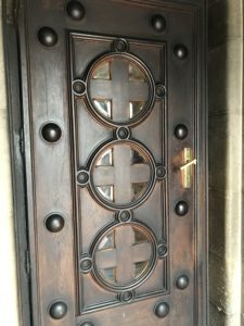 a door with a cross design
