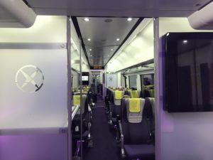 a train with seats and a door