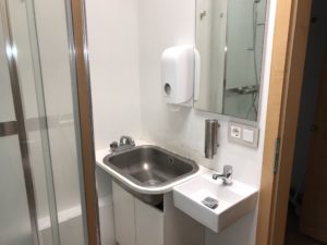 a sink and mirror in a bathroom