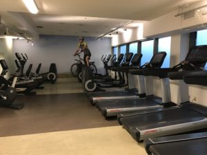 a person on a bike in a gym