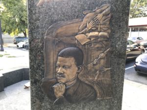 a stone with a picture of a man